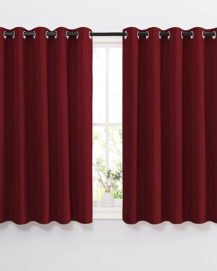 NICETOWN Blackout Draperies Curtain Panels - Thermal Insulated Solid Grommet Blackout Curtains/Panels/Drapes for Living Room(Burgundy Red, 1 Pair, 66 by 54-Inch)