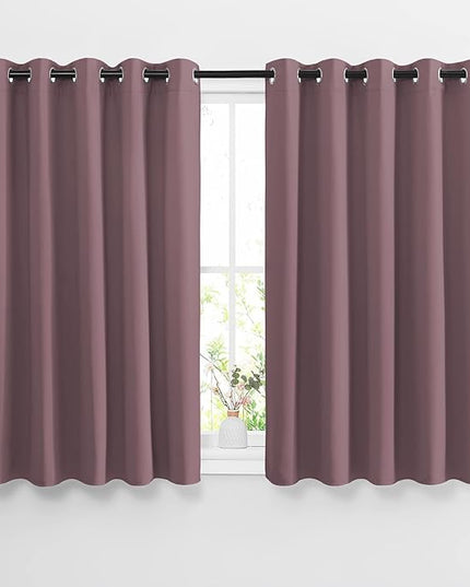 NICETOWN Bedroom Blackout Curtains & Drapes - Grommet Solid Window Treatment Thermal Insulated Noise Reducing Room Darkening Drapes for Bedroom/Home Office (2 Panels, W66 x L54, Dry Rose)