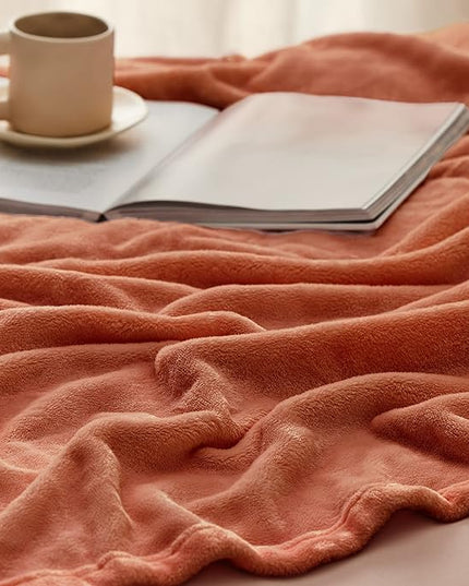 Bedsure GentleSoft Twin XL Fleece Blanket Dorm Bedding - Lightweight Soft Cozy Blankets for Bed, Sofa, Couch, Travel, Camping, Burnt Orange, 66"x90"