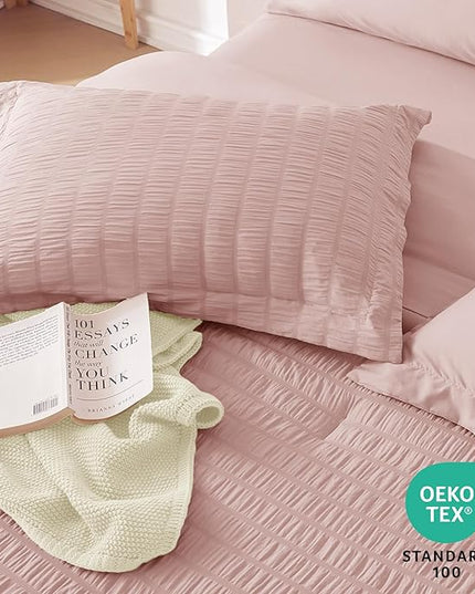 MUXHOMO 7 Pieces Queen Comforter Set, Seersucker Bed in a Bag Queen Size, All Season Luxury Bedding Set with Comforter, Flat Sheet, Fitted Sheet, Pillowcases & Shams, Rose Gold