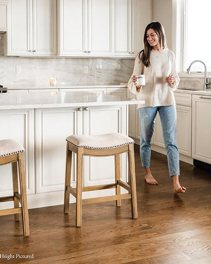 Maven Lane Adrien Backless Bar Stool – Set of 3 – 31 Inch Saddle Seat with Footrest – Natural Solid Wood Frame & Natural Fabric Upholstery – Ideal for Bars, Pub Tables & Tall Kitchen Counters