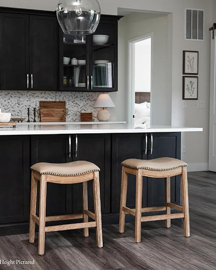 Maven Lane Adrien Backless Bar Stool – 31 Inch Saddle Seat with Footrest – Brown Solid Wood Frame & Beige Faux Leather Upholstery – Ideal for Bars, Pub Tables & Tall Kitchen Counters